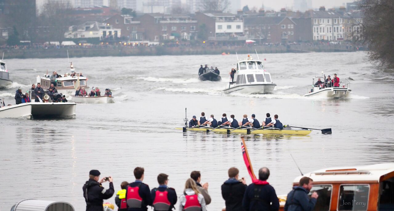 Boat Race approaching Chiswick Pier