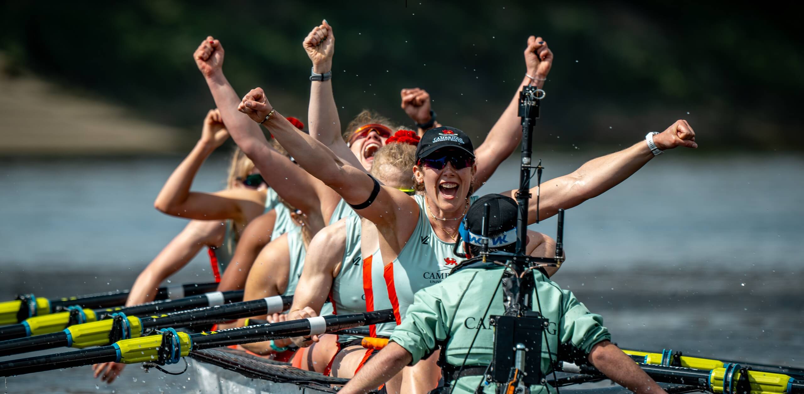 CUBC women celebrating after crossing finish line
