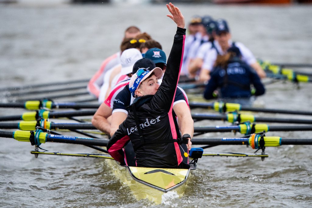 Jack Tottem raises his hand to object after Leander's race with OUBC 